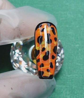 How to Master the Fiery Leopard Tortoiseshell Nail Trend at Home