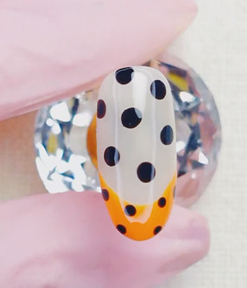 How to Recreate This Retro Orange French & Polka Dot Nail Art Look