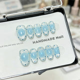 Handcrafted Shimmering Cat Eye Press-On Nails | Cute & Elegant Short Oval Fake Nails